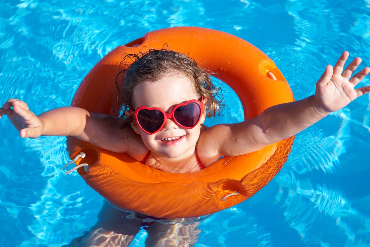 Girl in pool ring posing for the photo